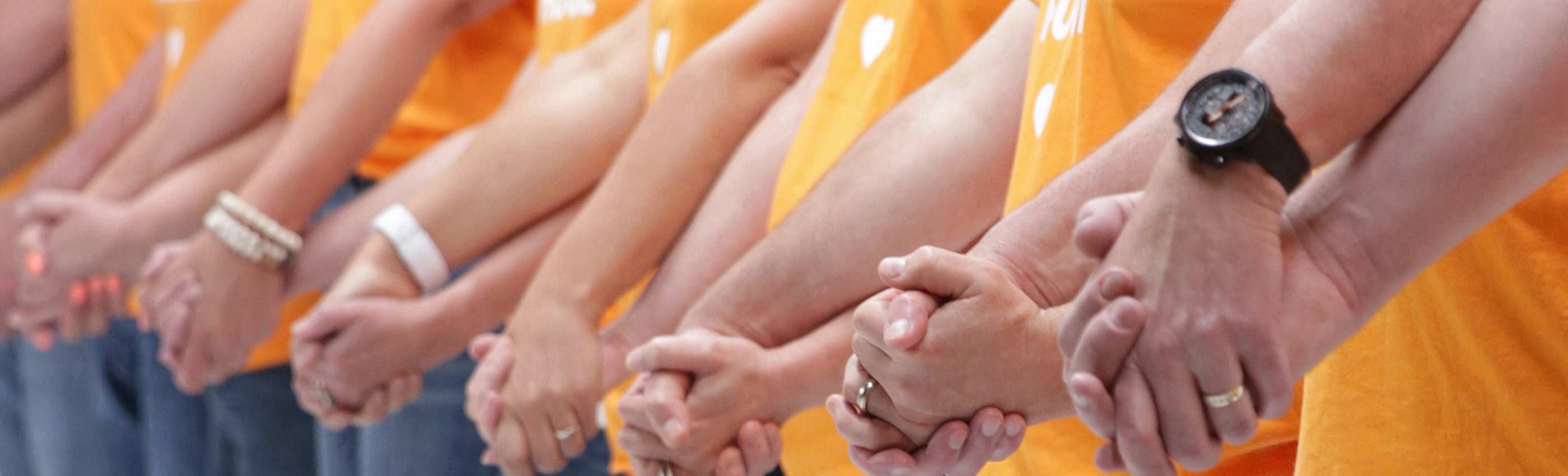Team holding hands